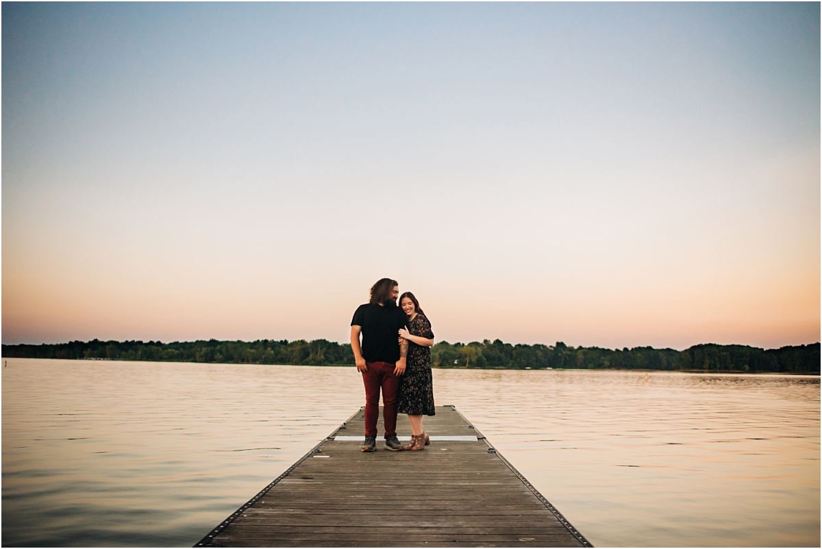 couple on dock for their engagement session