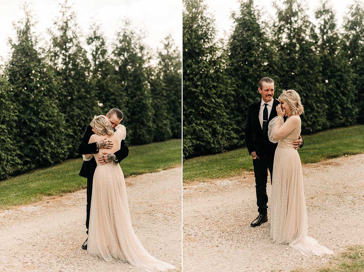 father of the bride embraces his daughter on her wedding day