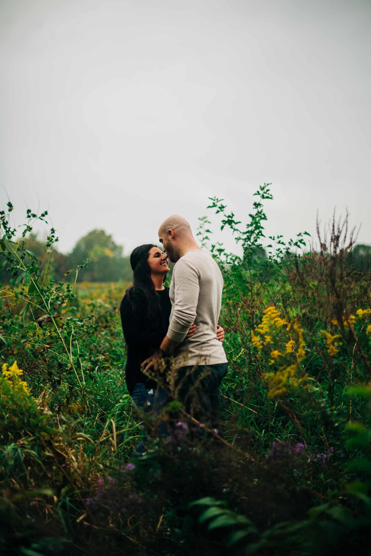 A moody engagement session in the rain