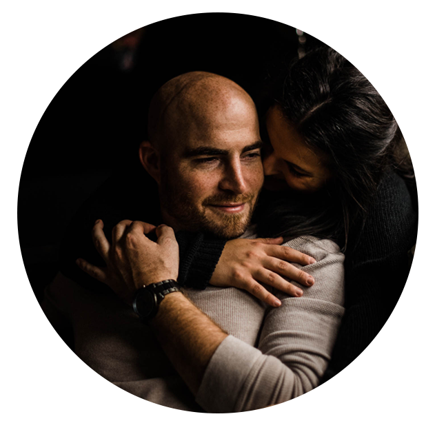 Engaged couple snuggles up for a moody engagement session in Columbus Ohio