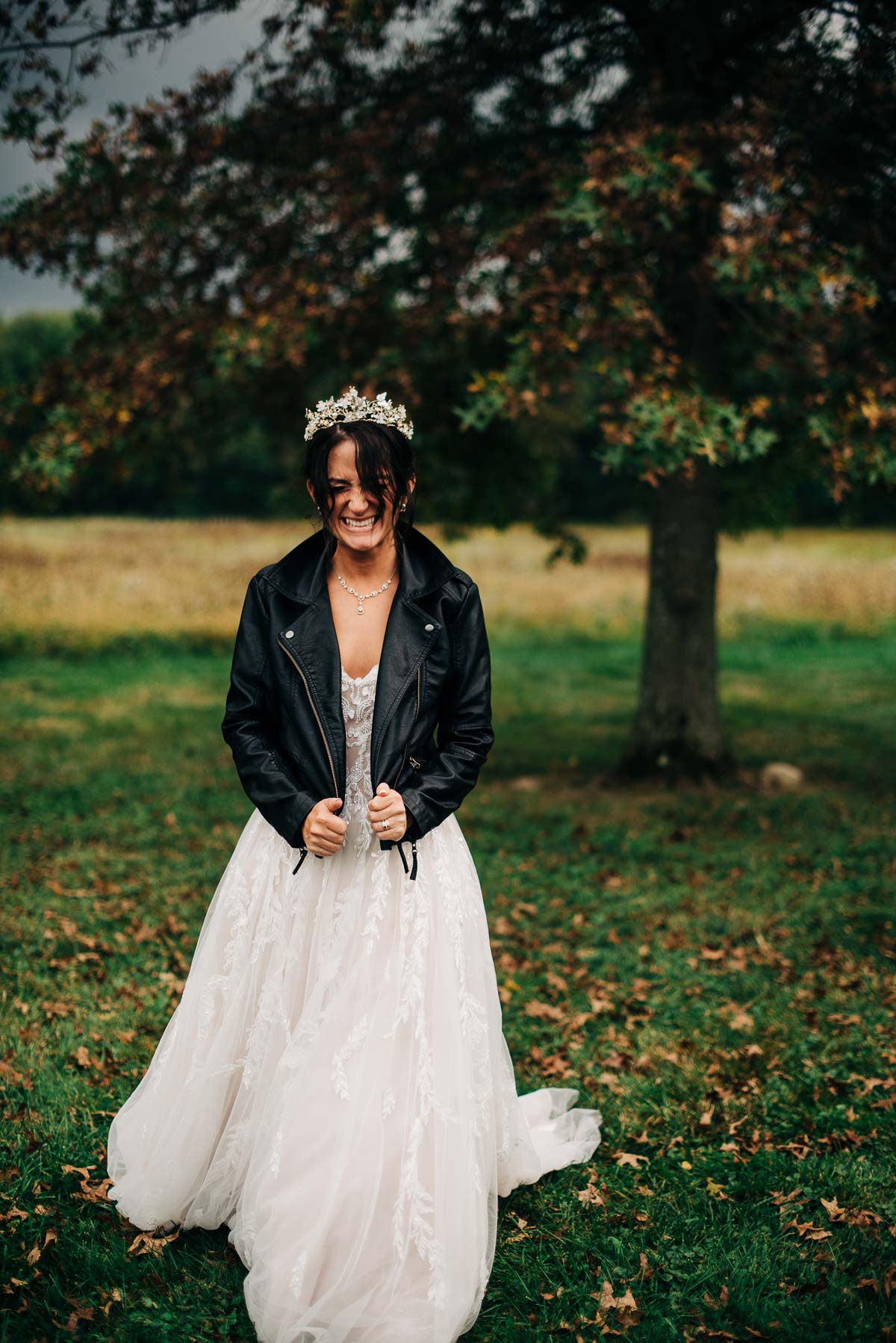 Bride shows off her leather jacket