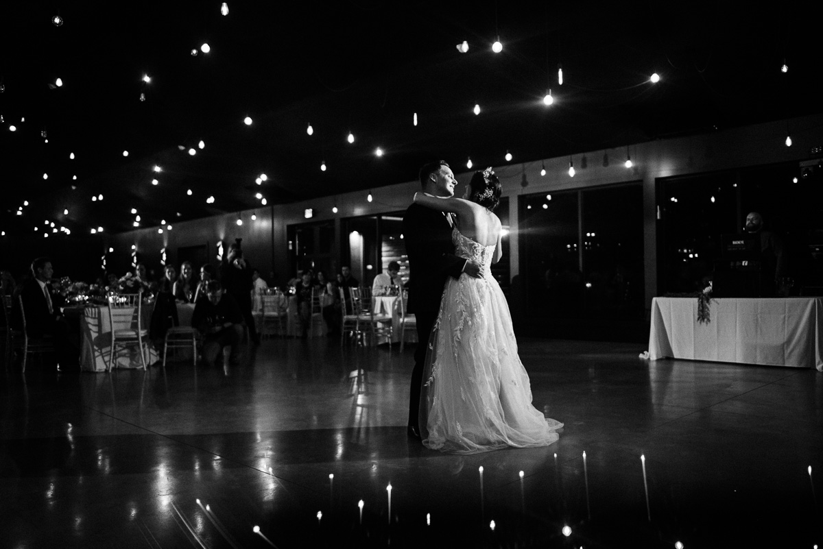 Bride and groom dance during their reception at Oak Grove