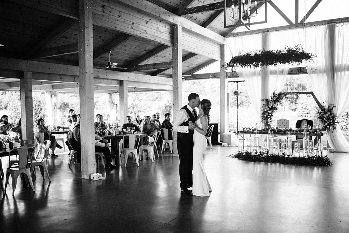 Bride and groom share their first dance at their Flora and Field wedding